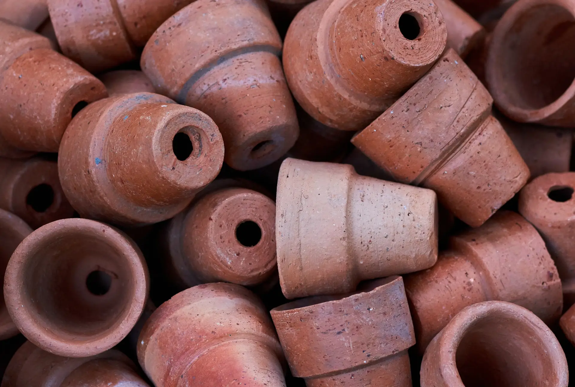 Background of brows clay pots in gardening shop