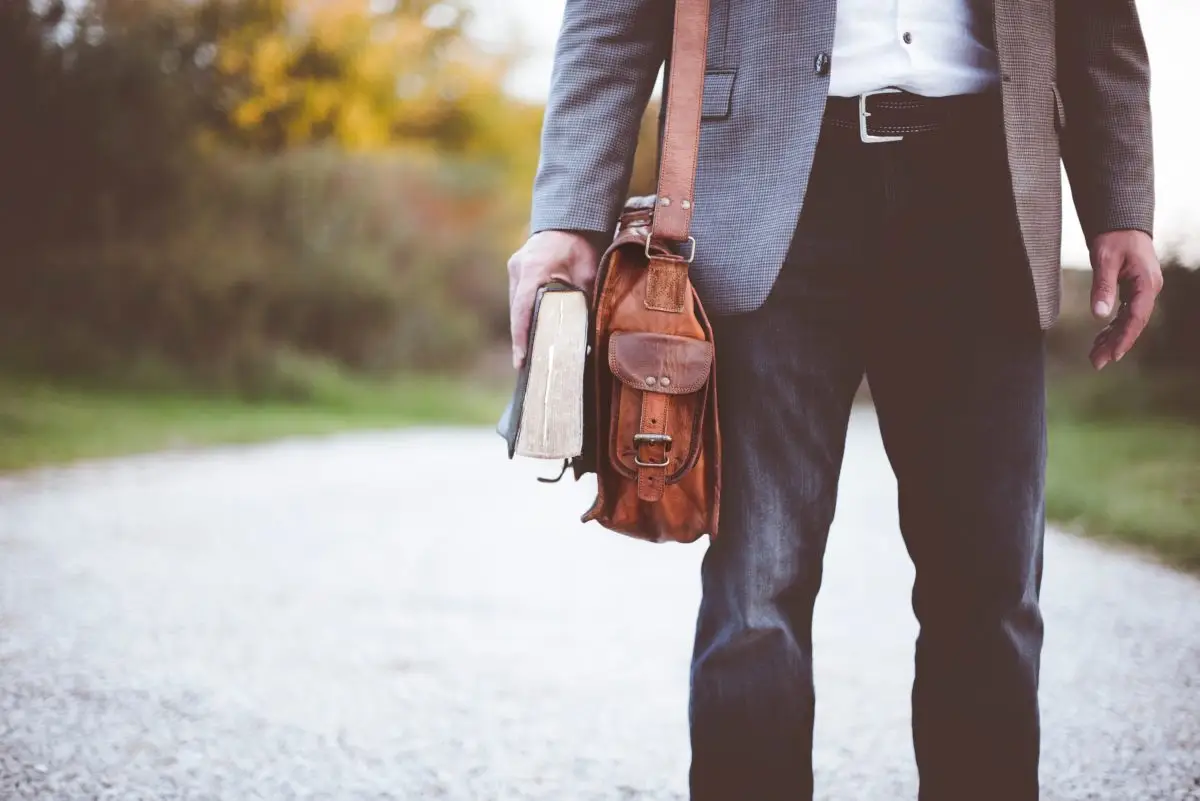 man holding a Bible